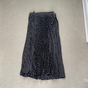 Brand new never worn black midi silky pleated skirt with white polka dots